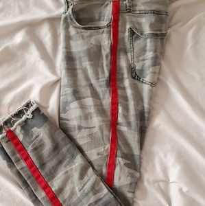 Army print jeans with red stripe